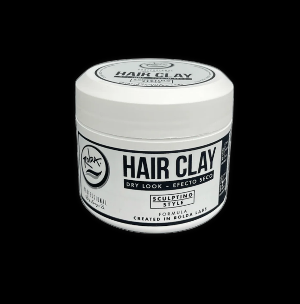 Rolda hair clay container with the product label, showing the matte black jar and branding for styling and shaping hair.